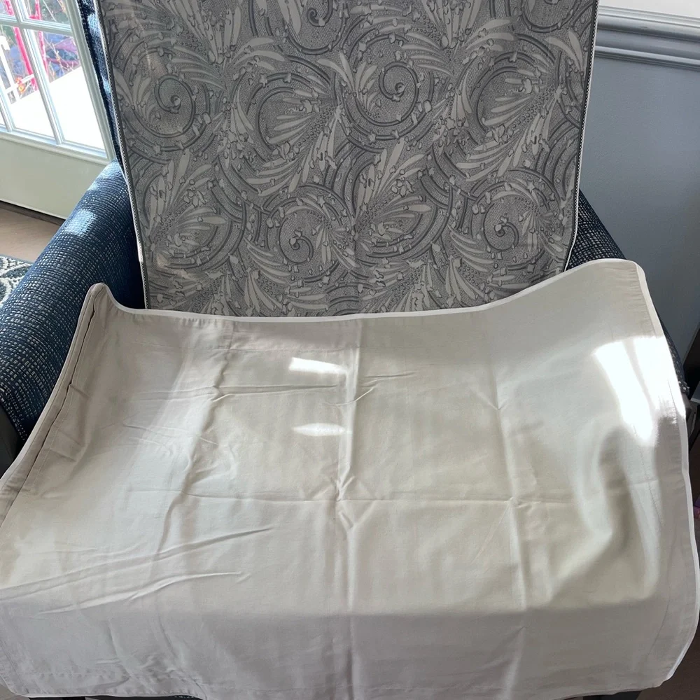 A pair of standard Yves Delorme pillow shams.